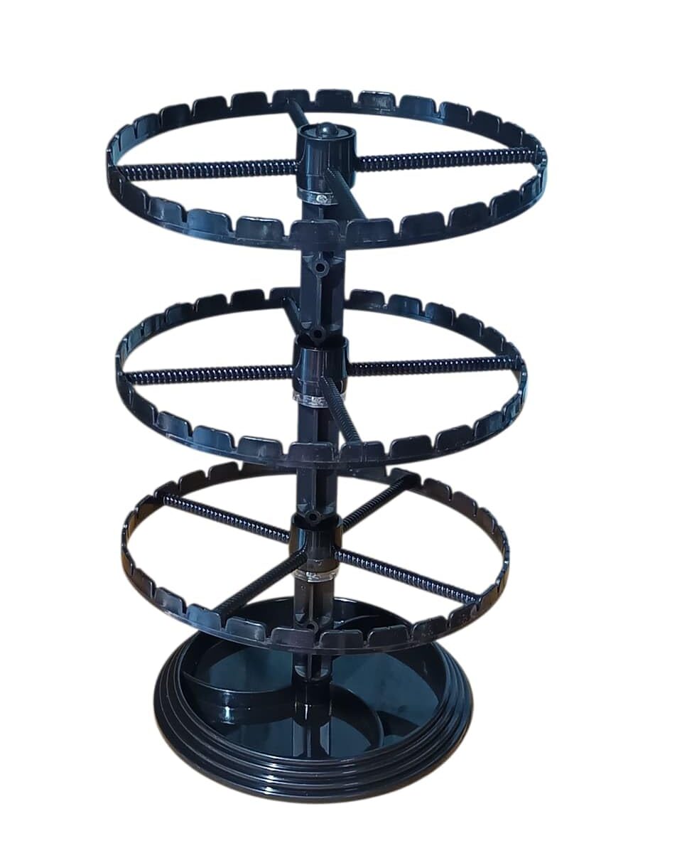 Black plastic 360-degree rotating 3-tier earring display stand with circular slotted rings for organizing and showcasing stud, hoop, hook, drop, and dangle earrings.